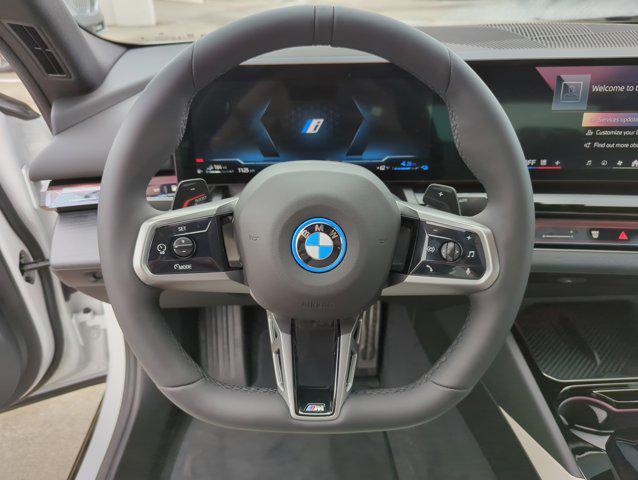 new 2026 BMW 550e car, priced at $84,825