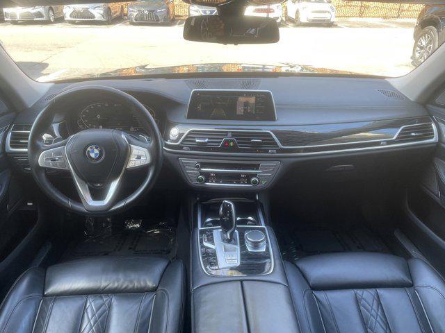 used 2022 BMW 745e car, priced at $52,996