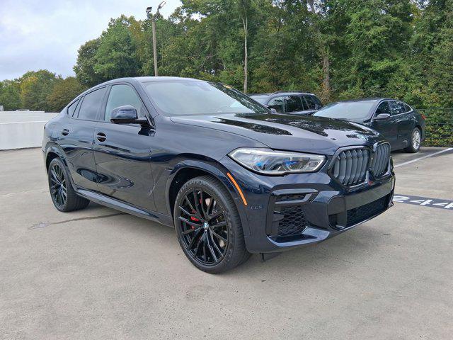 used 2023 BMW X6 car, priced at $68,097