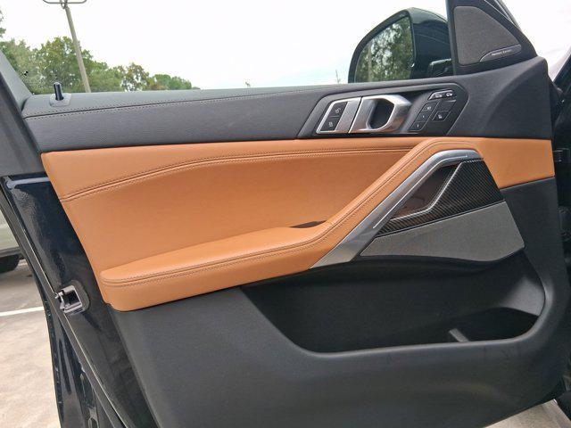 used 2023 BMW X6 car, priced at $68,097