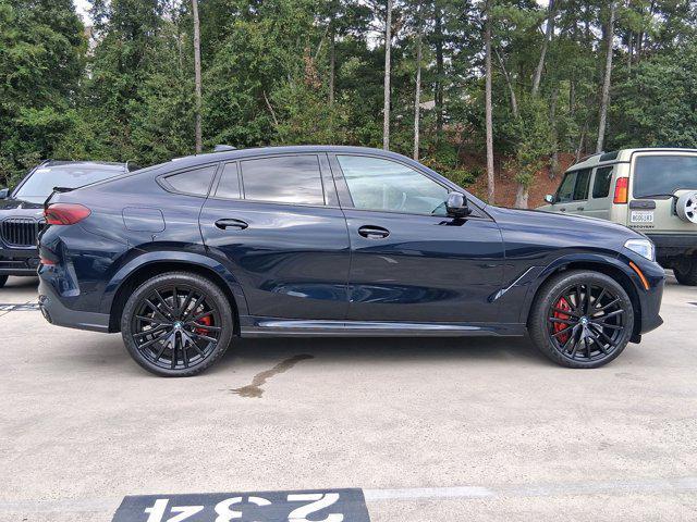 used 2023 BMW X6 car, priced at $68,097