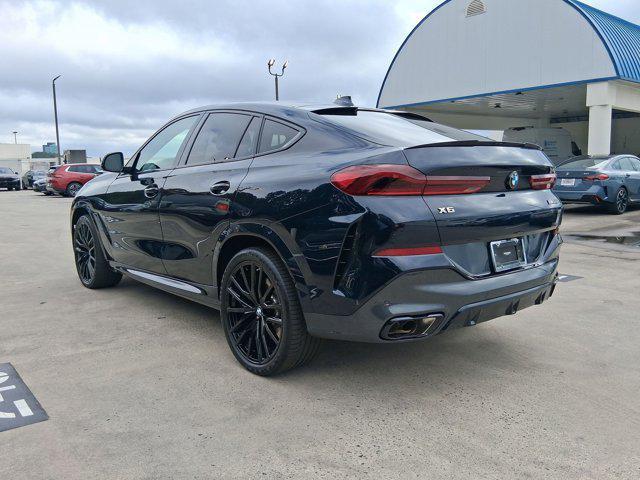 used 2023 BMW X6 car, priced at $68,097