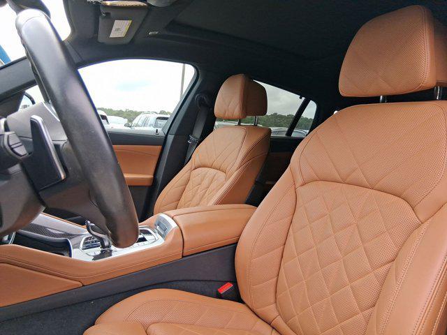 used 2023 BMW X6 car, priced at $68,097