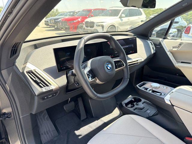 new 2025 BMW iX car, priced at $97,475