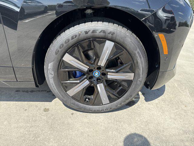 new 2025 BMW iX car, priced at $97,475