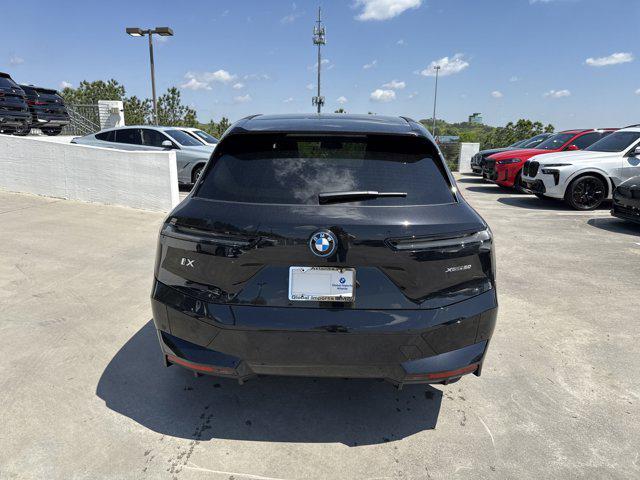 new 2025 BMW iX car, priced at $97,475