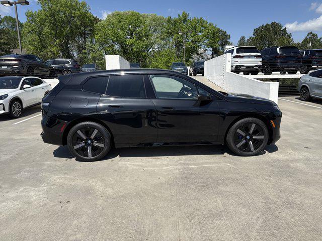 new 2025 BMW iX car, priced at $97,475