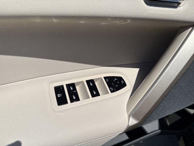 new 2025 BMW iX car, priced at $97,475