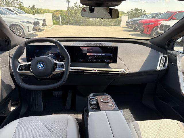 new 2025 BMW iX car, priced at $97,475