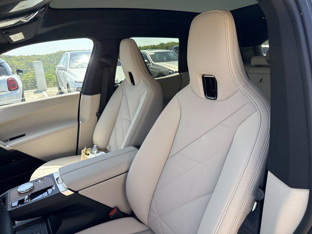 new 2025 BMW iX car, priced at $97,475