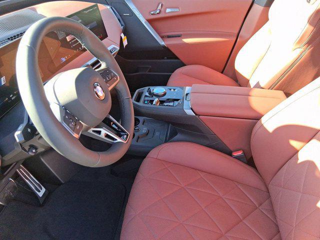 new 2026 BMW iX car, priced at $99,925
