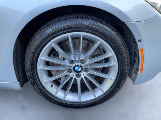 used 2014 BMW 750 car, priced at $15,497