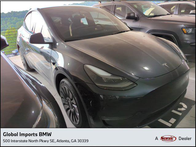 used 2024 Tesla Model Y car, priced at $35,997