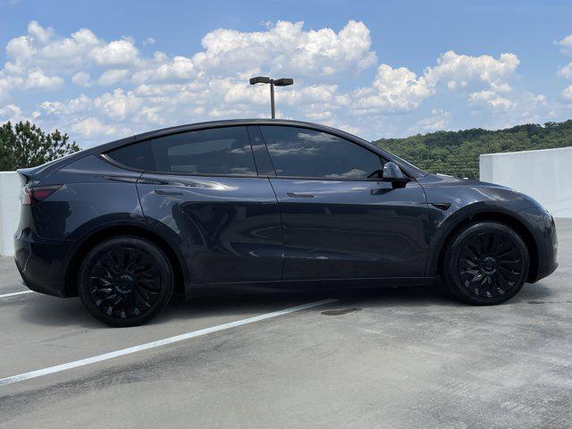 used 2024 Tesla Model Y car, priced at $35,997