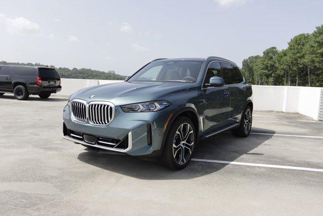 used 2025 BMW X5 car, priced at $68,051