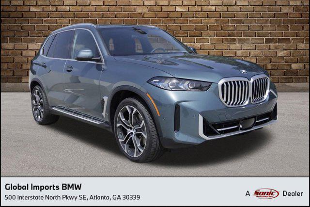 used 2025 BMW X5 car, priced at $68,051