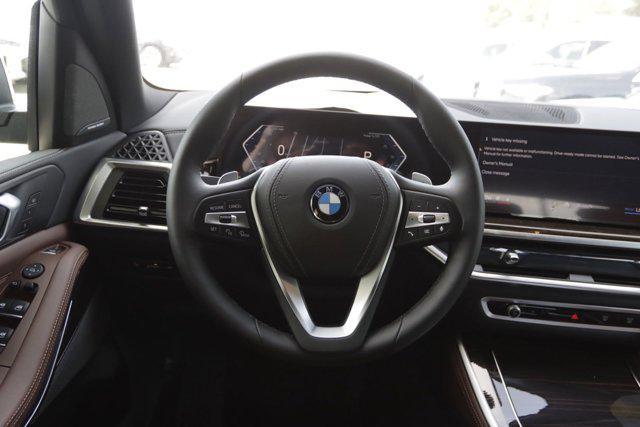 used 2025 BMW X5 car, priced at $68,051