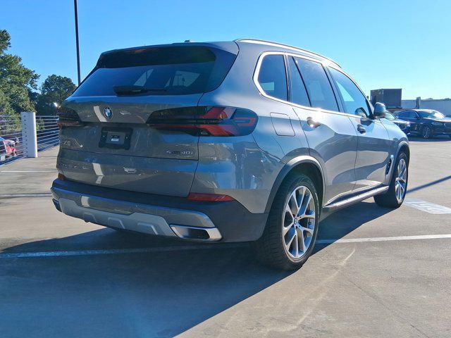 used 2025 BMW X5 car, priced at $56,097
