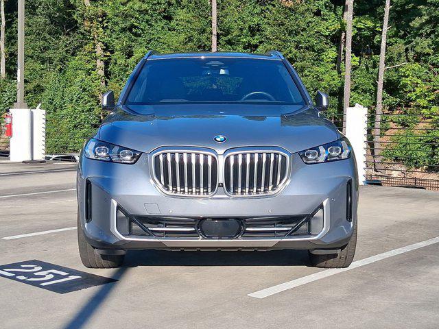 used 2025 BMW X5 car, priced at $56,097