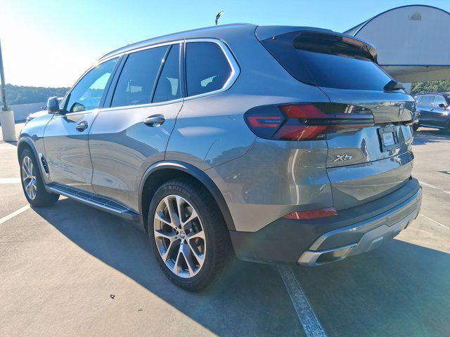 used 2025 BMW X5 car, priced at $56,097