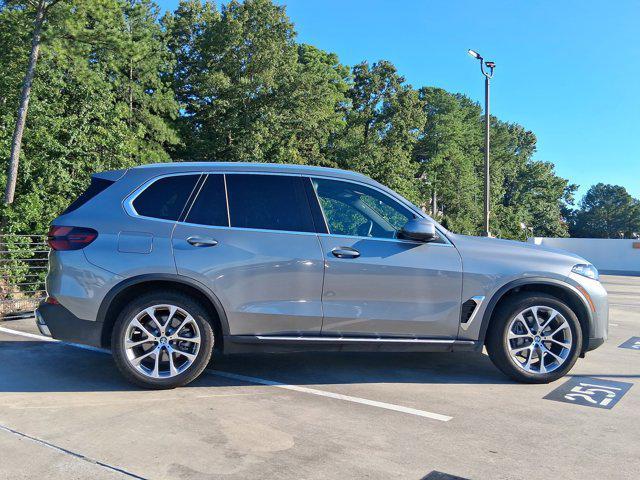 used 2025 BMW X5 car, priced at $56,097