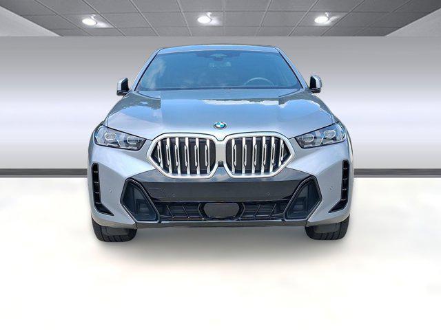 used 2025 BMW X6 car, priced at $66,096