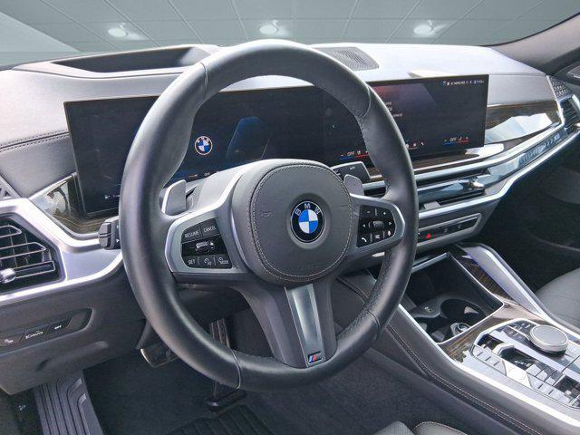 used 2025 BMW X6 car, priced at $66,096