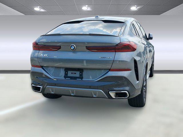 used 2025 BMW X6 car, priced at $66,096