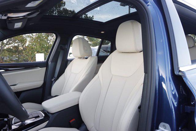 used 2025 BMW X4 car, priced at $58,430