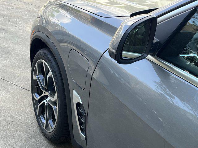 new 2025 BMW X5 PHEV car, priced at $84,310