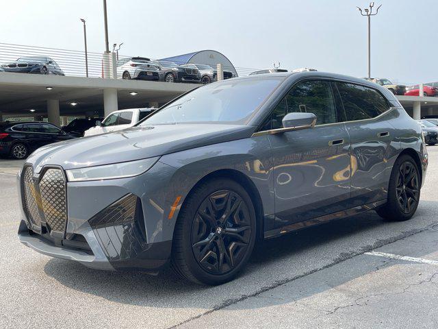used 2023 BMW iX car, priced at $66,097