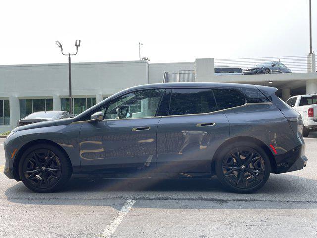 used 2023 BMW iX car, priced at $66,097