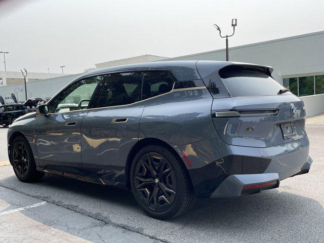 used 2023 BMW iX car, priced at $66,097