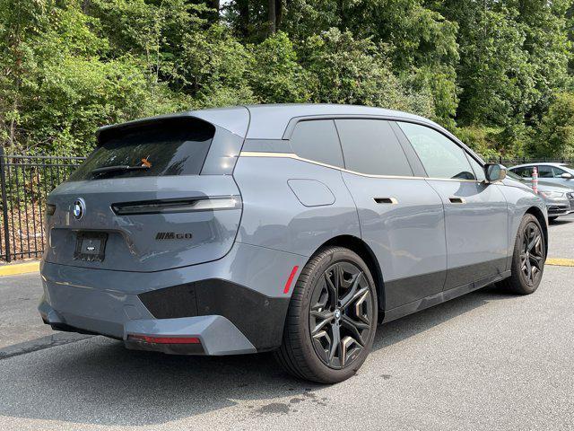 used 2023 BMW iX car, priced at $66,097