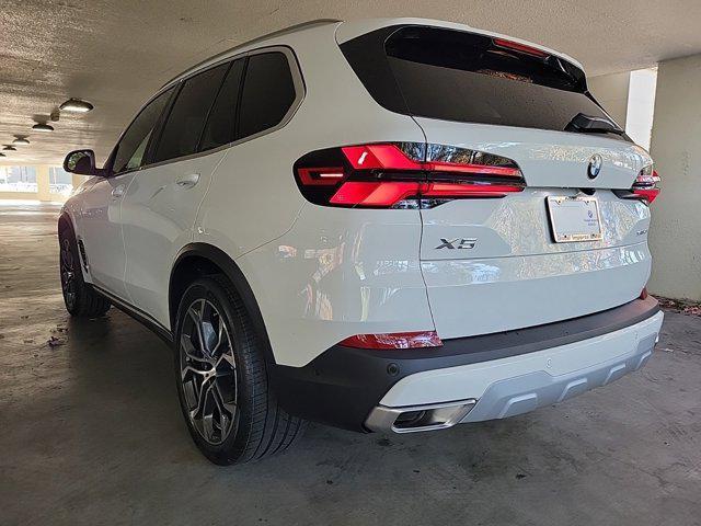 used 2025 BMW X5 car, priced at $64,121