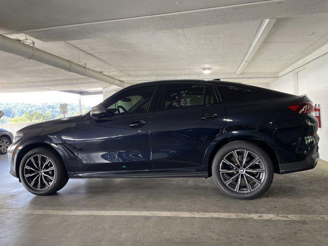 used 2022 BMW X6 car, priced at $64,097