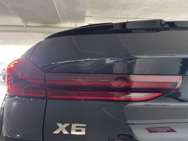 used 2022 BMW X6 car, priced at $64,097