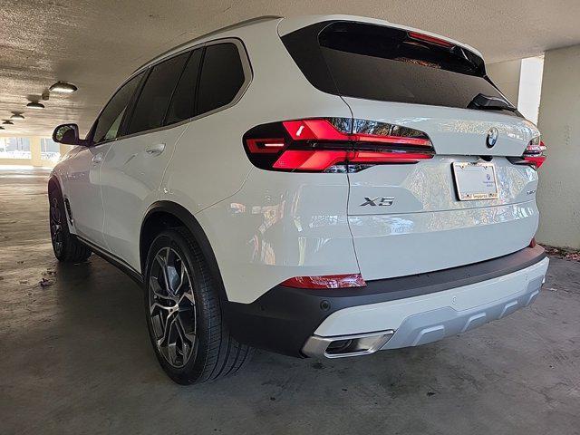 used 2025 BMW X5 car, priced at $67,619