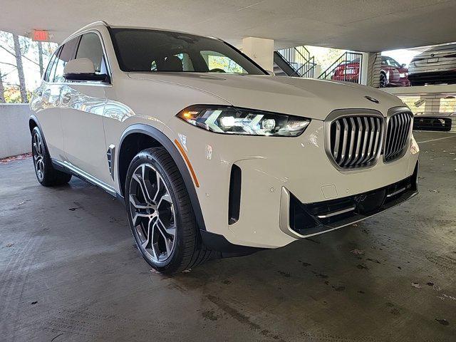 used 2025 BMW X5 car, priced at $67,619