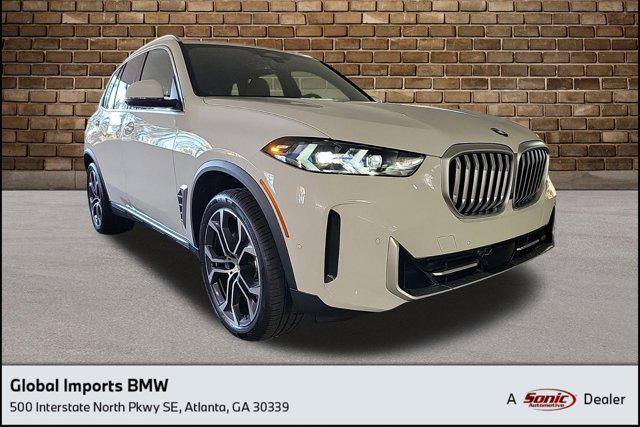 used 2025 BMW X5 car, priced at $67,619