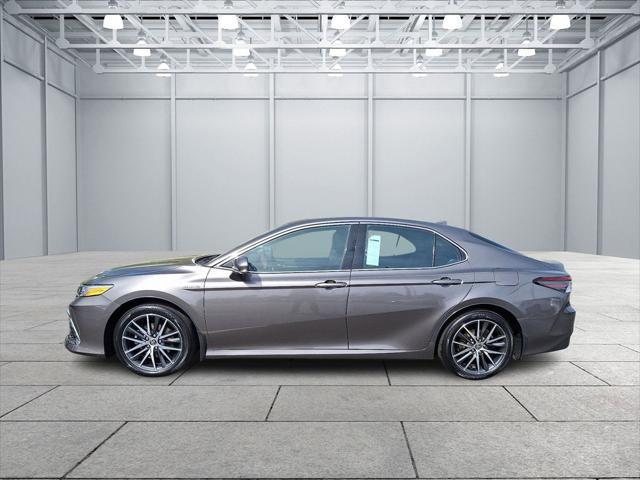 used 2021 Toyota Camry Hybrid car, priced at $25,243