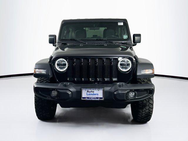 used 2021 Jeep Wrangler car, priced at $34,140