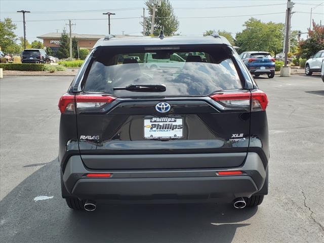 used 2021 Toyota RAV4 Hybrid car, priced at $34,273