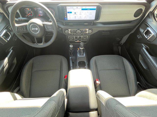 used 2024 Jeep Wrangler car, priced at $34,598