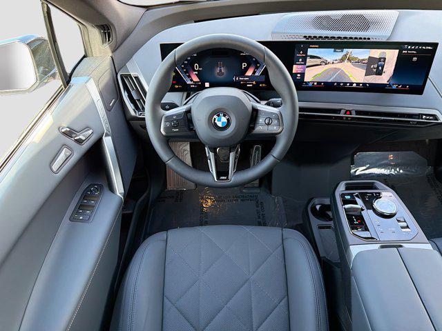 new 2026 BMW iX car, priced at $93,925