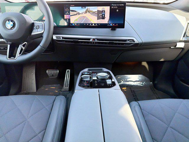 new 2026 BMW iX car, priced at $93,925