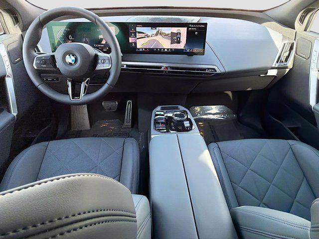 new 2026 BMW iX car, priced at $93,925