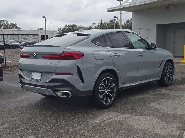 used 2024 BMW X6 car, priced at $72,565