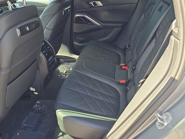 used 2025 BMW X6 car, priced at $65,776