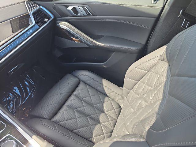 used 2025 BMW X6 car, priced at $65,776